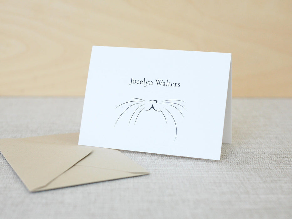 a close up of a card with a cat's face