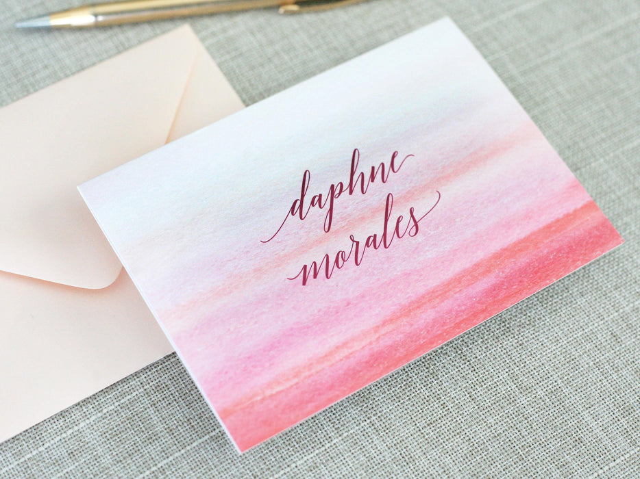 a greeting card with a watercolor background and the words sapphire merales on it