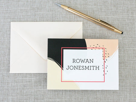 a close up of a piece of paper with a pen on top of it