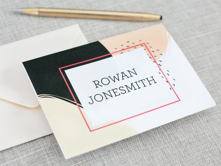 a close up of a piece of paper with a pen
