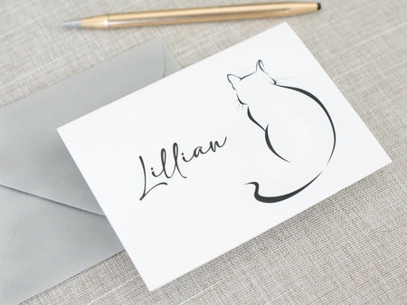 a card with a drawing of a cat on it