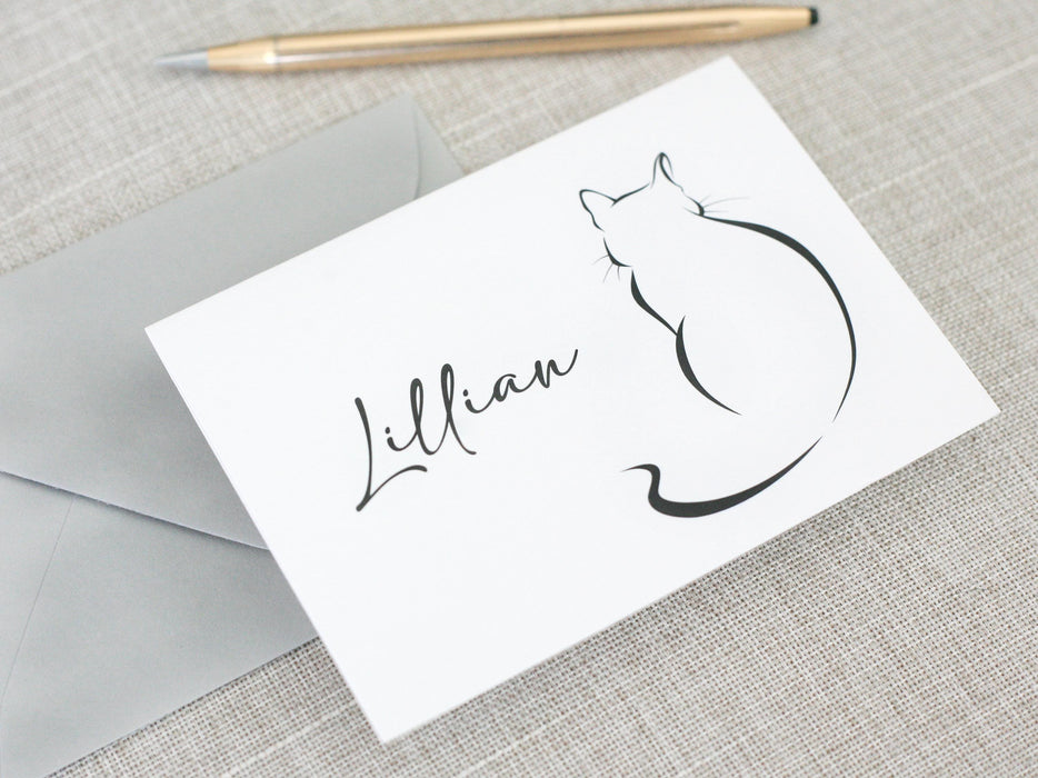 a card with a drawing of a cat on it