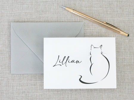 a card with a drawing of a cat on it