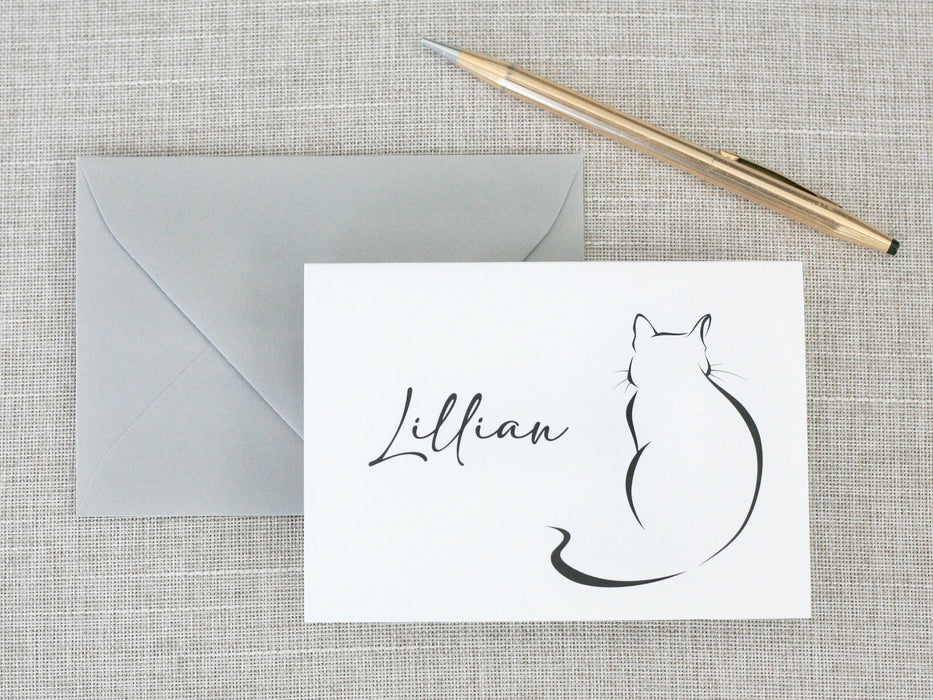 a card with a drawing of a cat on it