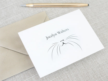 a close up of a note with a pen on a table