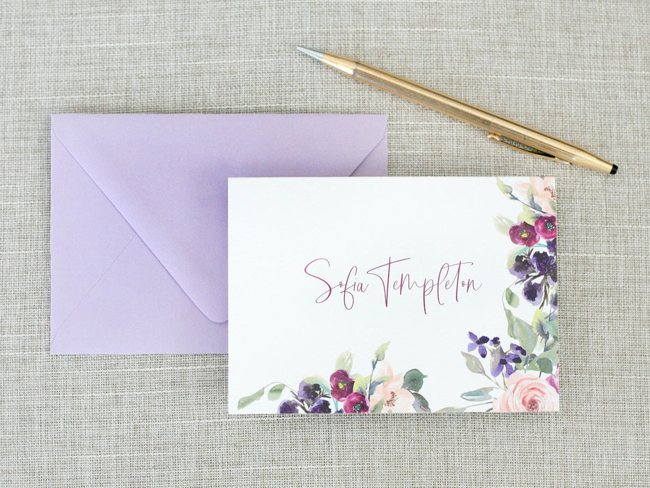 a note with a pen next to it on a table