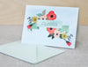 a greeting card with a floral design on it