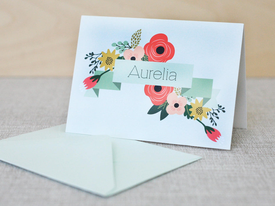 a greeting card with a floral design on it