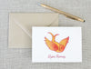 a card with a bird on it next to a pen